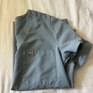 FIGS caterina one pocket scrub top in dusty blue